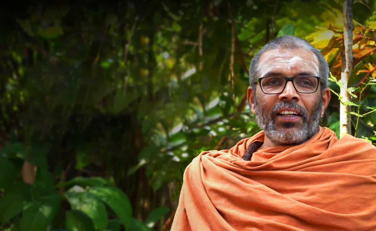 SAGE representative outdoors in lush green environment.